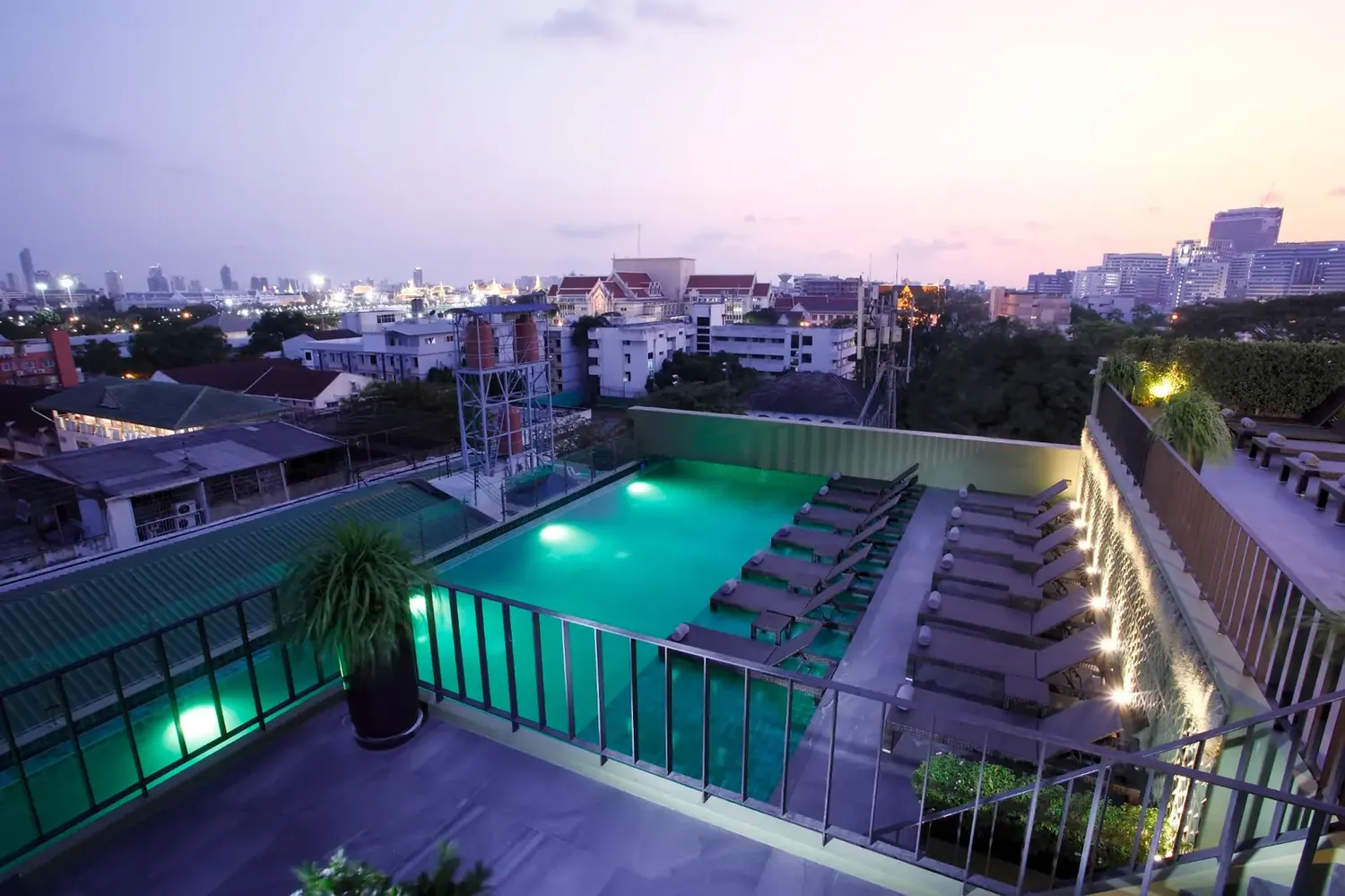 Rooftop pool at sunset at Chillax Heritage Hotel Khaosan
